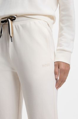 Cuffed tracksuit bottoms with signature-stripe drawcord, Natural