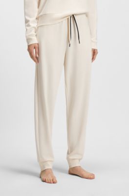 Cuffed tracksuit bottoms with signature-stripe drawcord, Natural