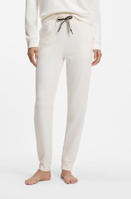 Cuffed tracksuit bottoms with signature-stripe drawcord, Natural