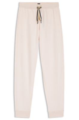 Trainingsbroek met boorden en met kenmerkend gestreepte koorden, Lichtroze