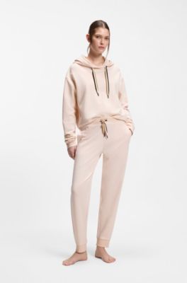 Cuffed tracksuit bottoms with signature-stripe cords, light pink