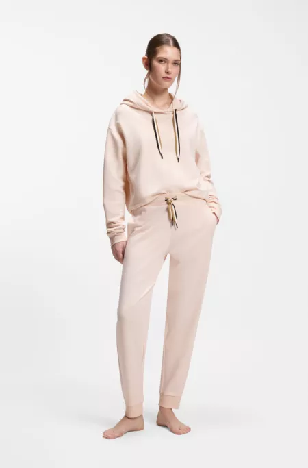 Cuffed tracksuit bottoms with signature-stripe cords