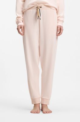 Cuffed tracksuit bottoms with signature-stripe drawcord, light pink