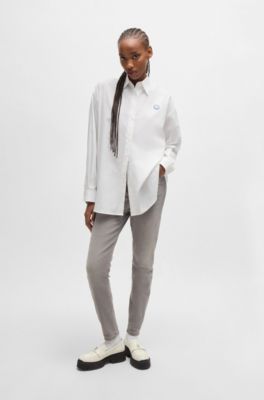 Oversized-fit blouse with graffiti-style logos, White