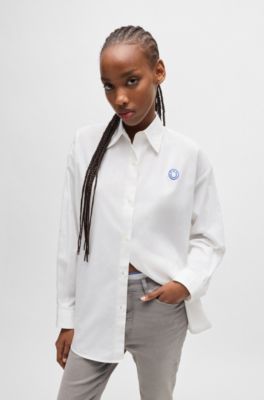 Oversized-fit blouse with graffiti-style logos, White