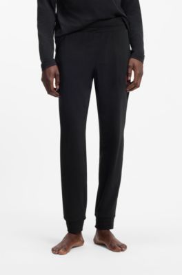 Cuffed loungewear bottoms in stretch cotton with logo print, Black