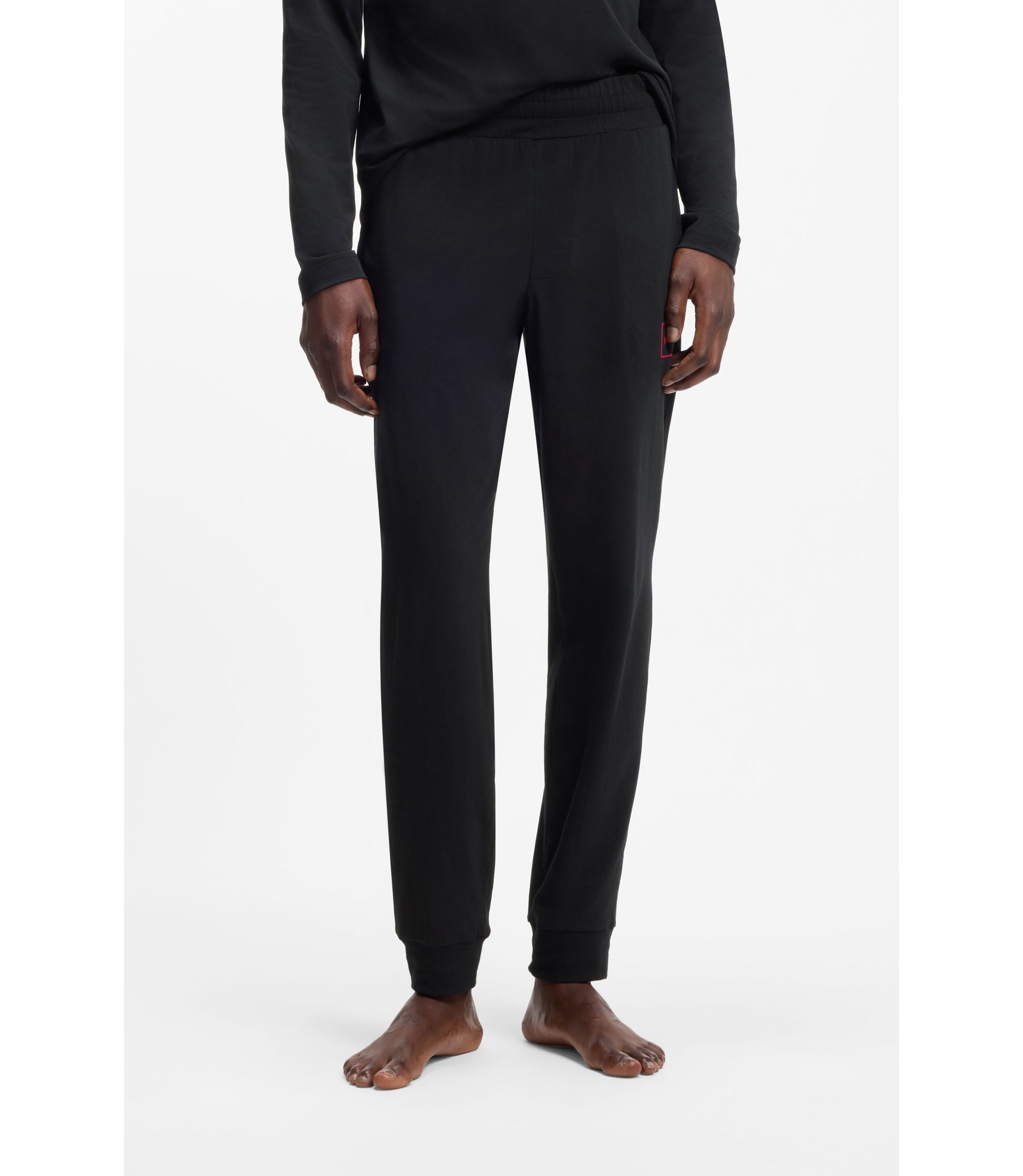 Jogginghose aus Stretch-Baumwolle mit Beinbündchen und gerahmtem Logo