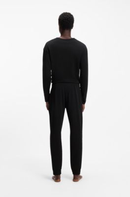 Cuffed loungewear bottoms in stretch cotton with logo print, Black