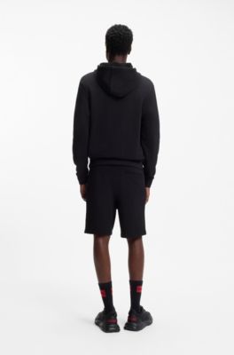 Cuffed loungewear bottoms in stretch cotton with logo print, Black