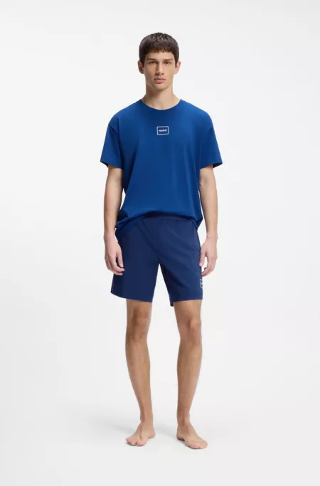 Stretch-cotton shorts with framed logo print