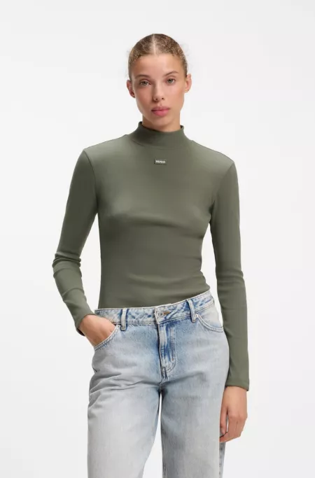 High-neck stretch-cotton top with logo badge