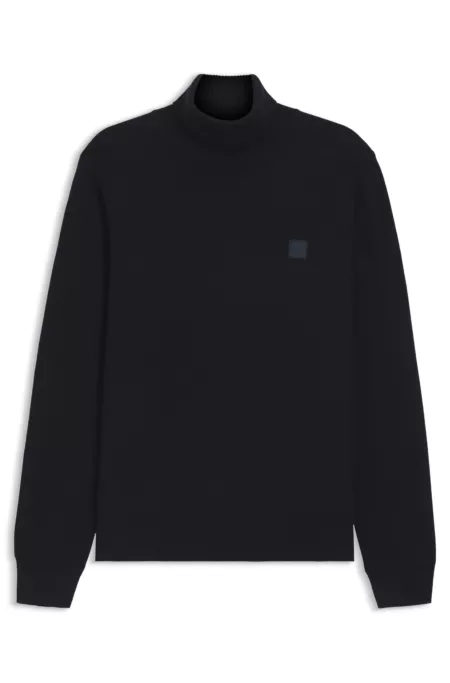 Rollneck sweater in cotton and cashmere with logo patch