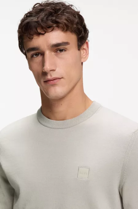 Knitted sweater in cotton and cashmere with logo label