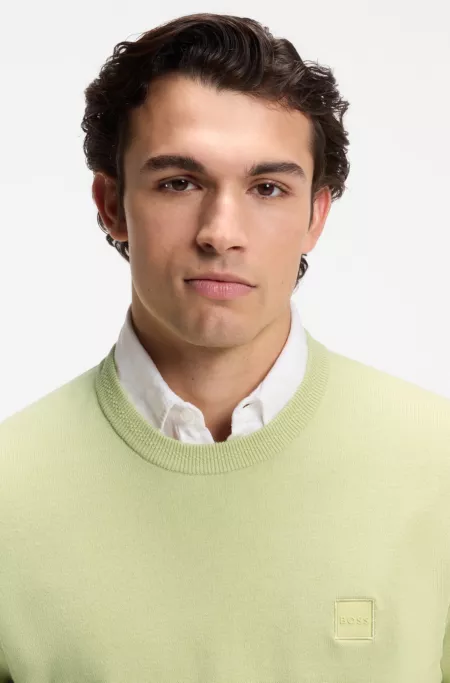 Knitted sweater in cotton and cashmere with logo label