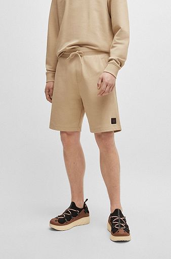 Cotton-terry relaxed-fit shorts with logo trim, Light Beige
