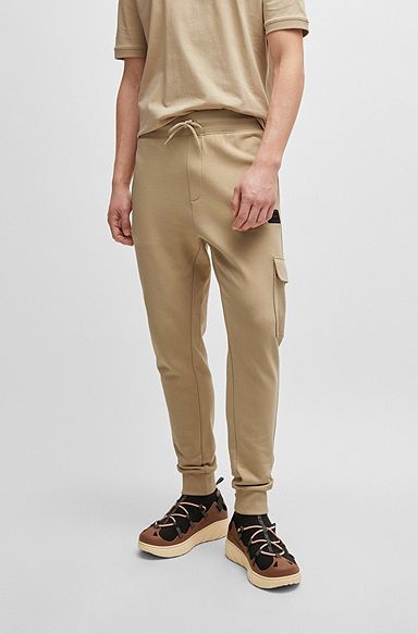 Cotton-terry tracksuit bottoms with logo trim, Light Beige