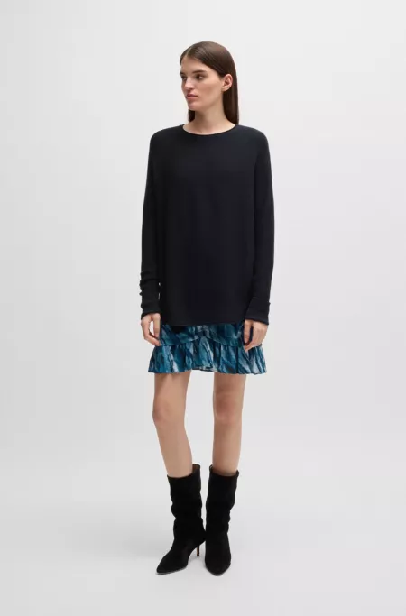 Relaxed-fit sweater with rolled edges and logo charm