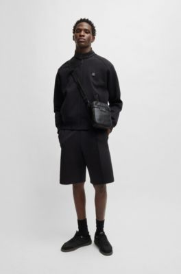 Grained faux-leather reporter bag with stacked-logo trim, Black