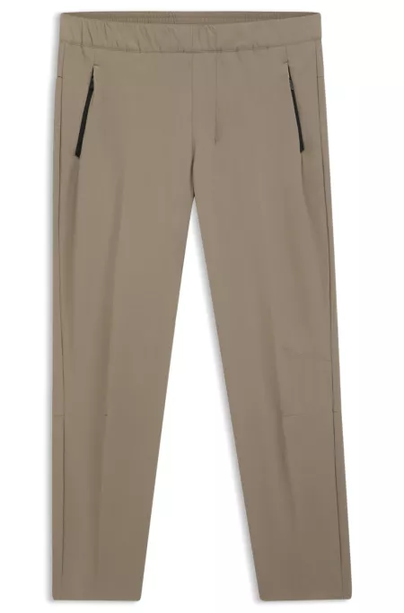 Tapered-leg trousers in water-repellent stretch fabric