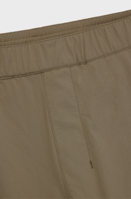 Tapered-leg trousers in water-repellent stretch fabric, Beige