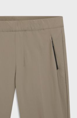Pantaloni in tessuto elasticizzato idrorepellente con gamba affusolata, Beige