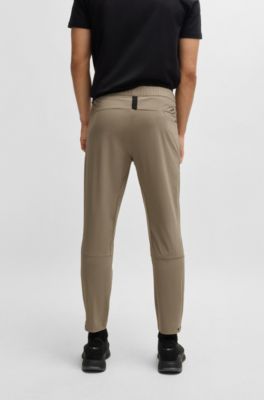 Tapered-leg trousers in water-repellent stretch fabric, Beige