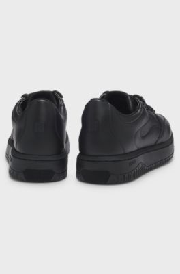 Lace-up trainers in tumbled leather, Black