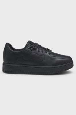 Lace-up trainers in tumbled leather, Black