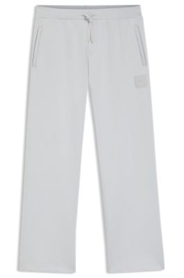Tracksuit bottoms in a drop-needle cotton blend, Light Grey