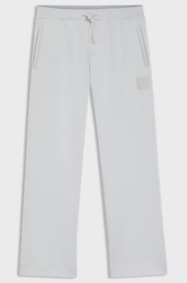 Tracksuit bottoms in a drop-needle cotton blend, Light Grey