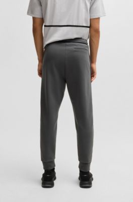 Cotton-blend tracksuit bottoms with tape and logo, Dark Grey
