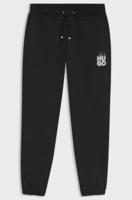 Cotton-terry tracksuit bottoms with smoke logo, Black