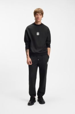 Cotton-terry tracksuit bottoms with smoke logo, Black