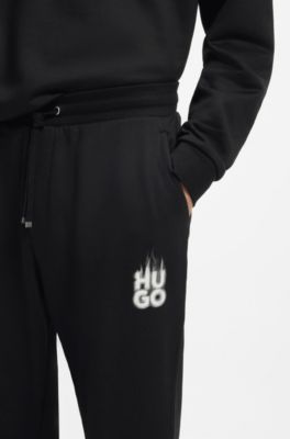 Cotton-terry tracksuit bottoms with smoke logo, Black