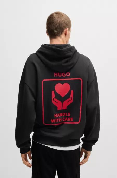 Cotton-terry hoodie with slogan and heart graphics