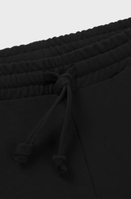 Cotton-terry tracksuit bottoms with logo print, Black