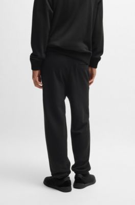 Cotton-terry tracksuit bottoms with logo print, Black