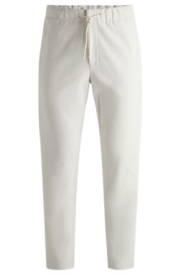 Tapered-fit trousers in performance corduroy, White