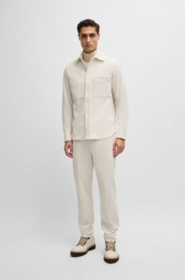 Tapered-fit trousers in performance corduroy, White