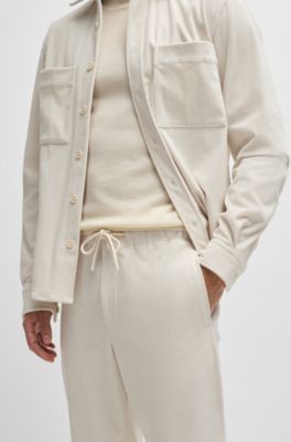 Tapered-fit trousers in performance corduroy, White