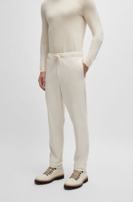 Tapered-fit trousers in performance corduroy, White