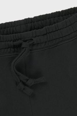 Cotton-terry relaxed-fit shorts with logo print, Black
