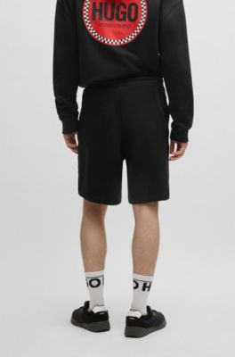 Cotton-terry relaxed-fit shorts with logo print, Black