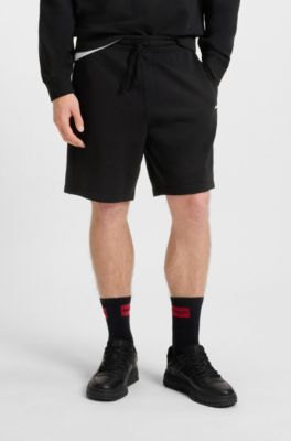 Shorts i sweatkvalitet af bomuld med logoprint, Sort