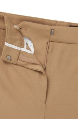 Pantaloni regular fit in tessuto elasticizzato con tasche con zip, Beige