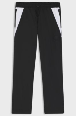 Loose-fit tracksuit bottoms with Happy HUGO logo, Black