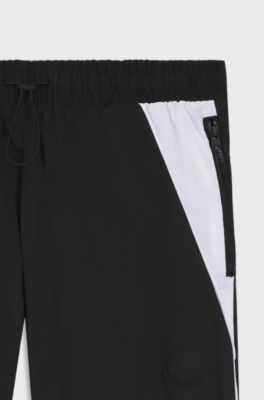 Loose-fit tracksuit bottoms with Happy HUGO logo, Black