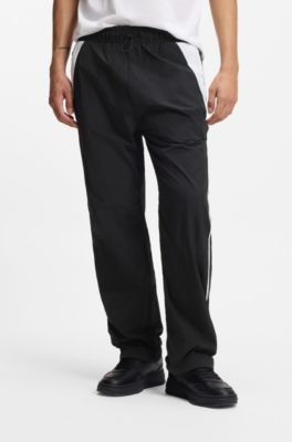 Loose-fit tracksuit bottoms with Happy HUGO logo, Black