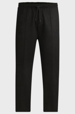 Faux-suede tracksuit bottoms with logo badge, Black