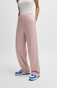Oversized-fit tracksuit bottoms with logo jacquard, Pink Patterned